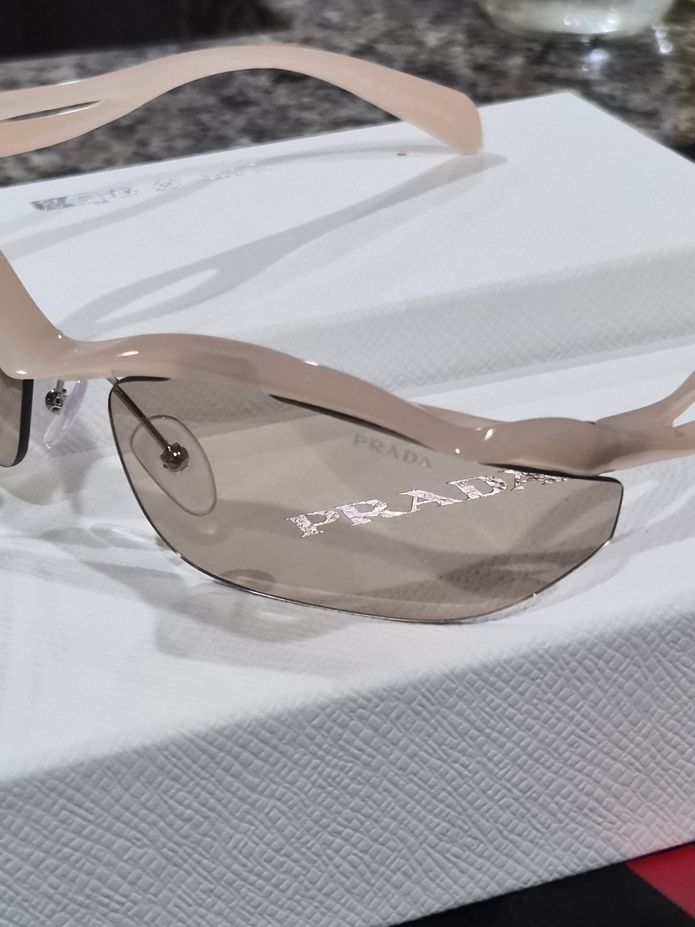 Prada Rimless Sunglasses in Blush Pink and Taupe